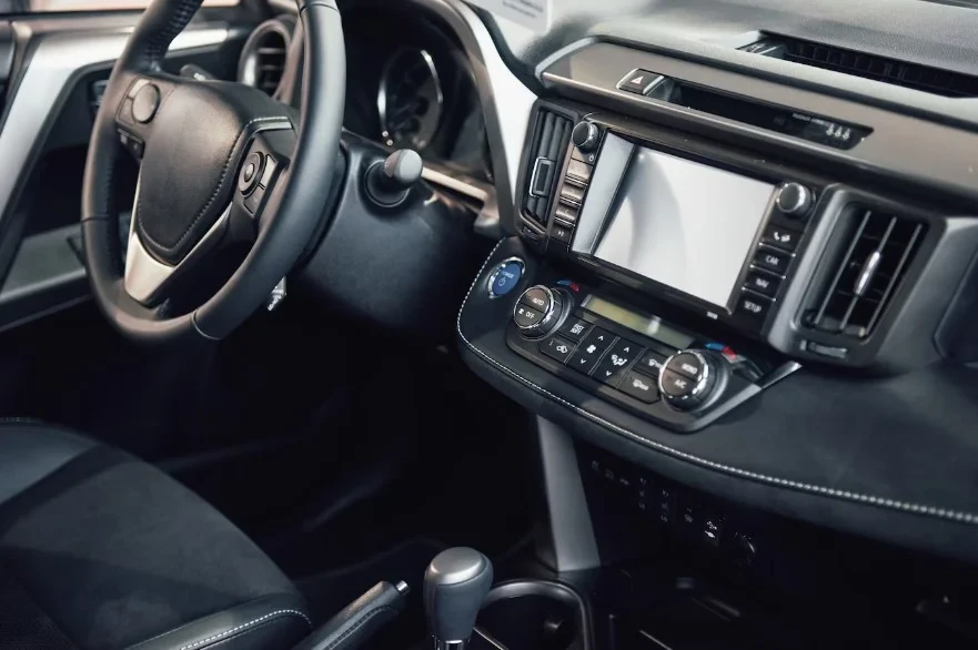 luxury-car-interior-steering-wheel-shift-lever-dashboard-computer